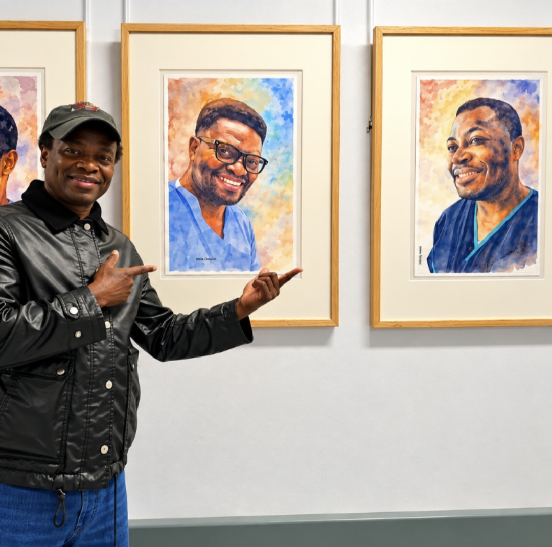 Nduka Omeife with his Black History Month portrait, York Hospital exhibition 2026, photograph 1